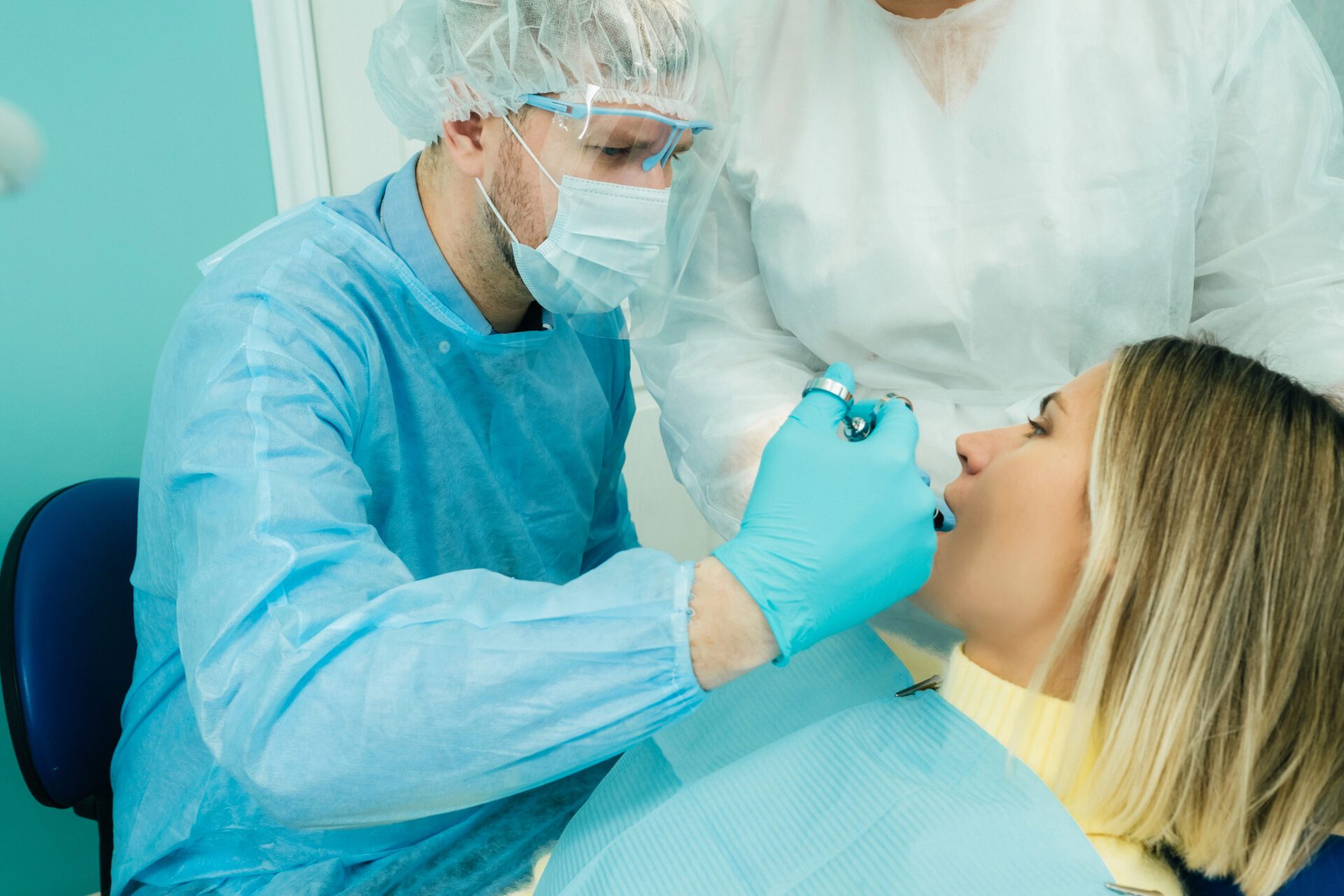 Emergency dentist performing a tooth extraction in Donelson, TN
